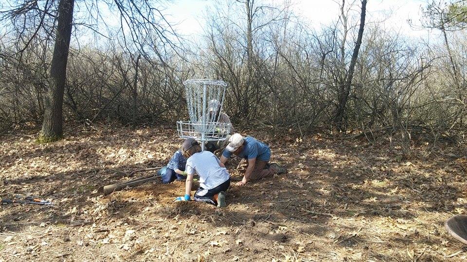 Hole 13 basket going in