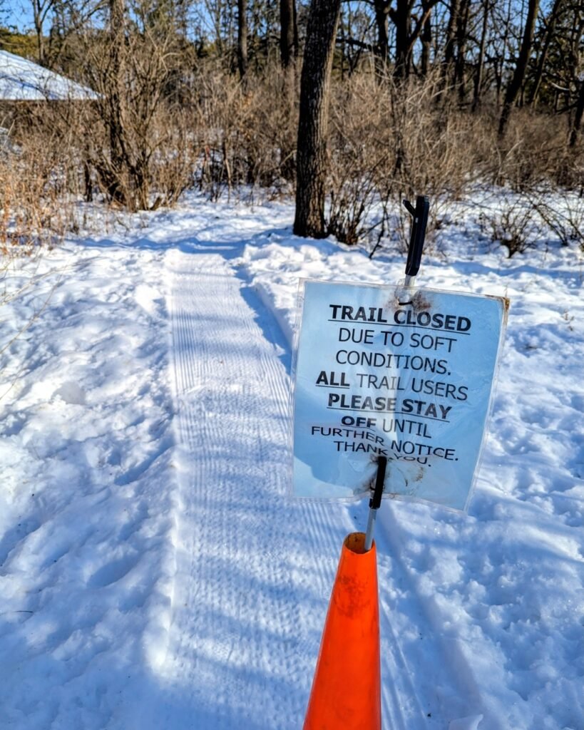 Sign marking the trail as closed