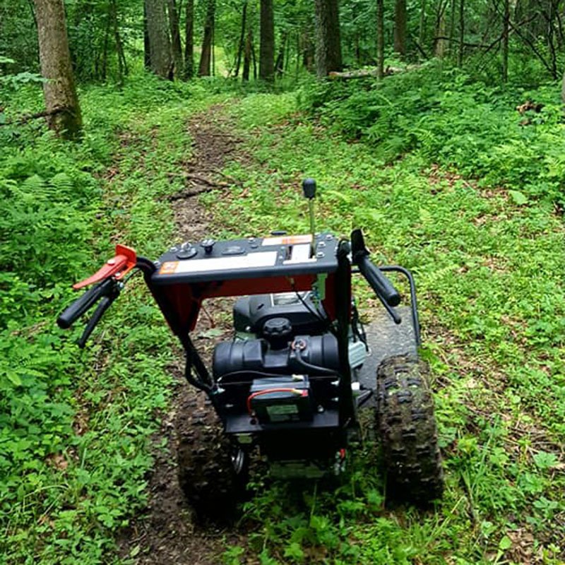 A DR Mower on a weedy trail.