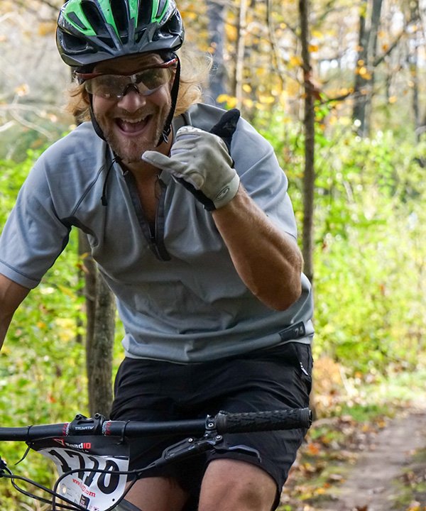 robbie mini riding a bike